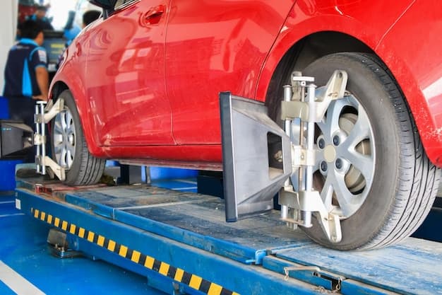 Car wheel alignment equipment fitted to a vehicle on a lift